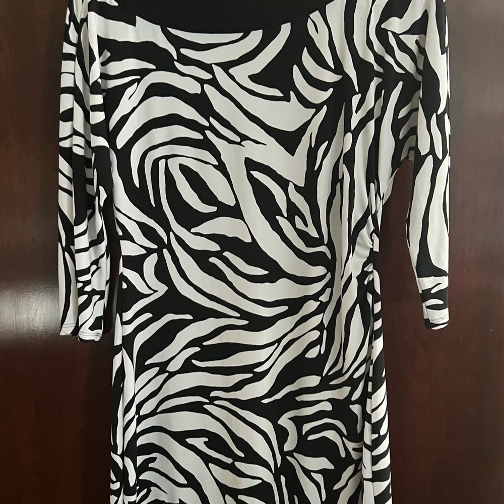 Zebra print fashion is still very much in style.  White/black house market